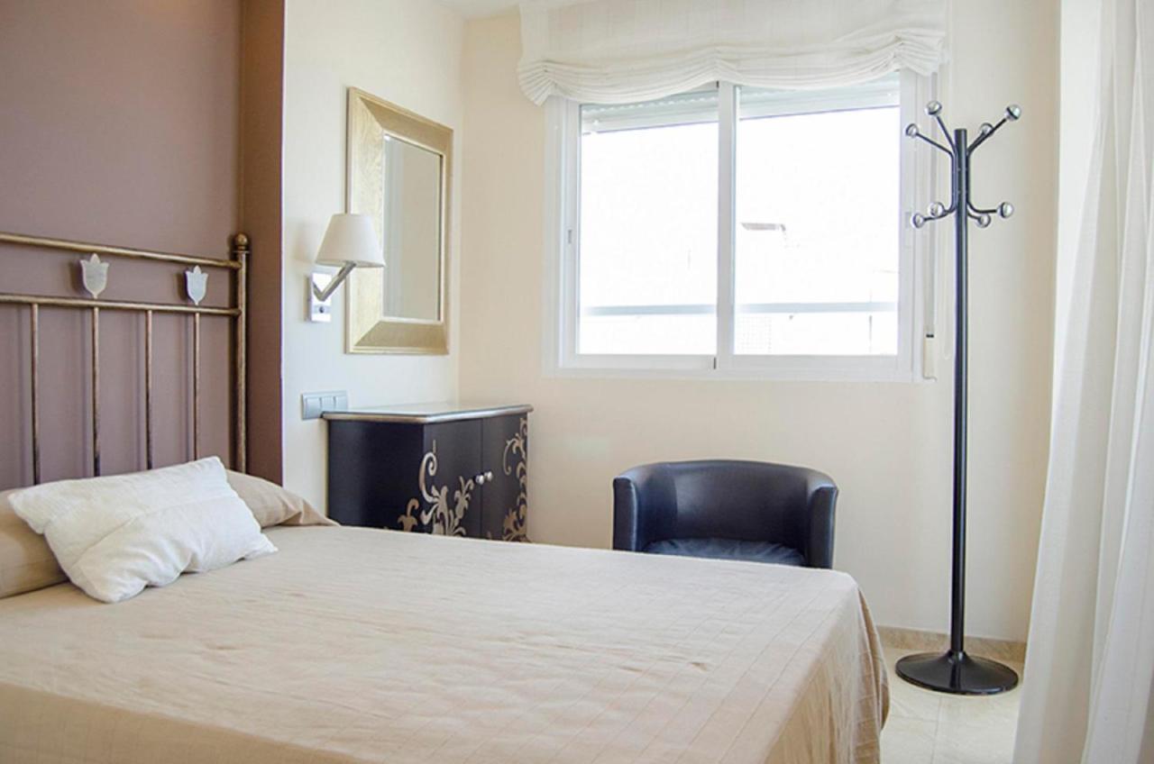 Apartamentos Terrasol 1ª Linea Playa Los Angeles 托雷德尔马尔 外观 照片
